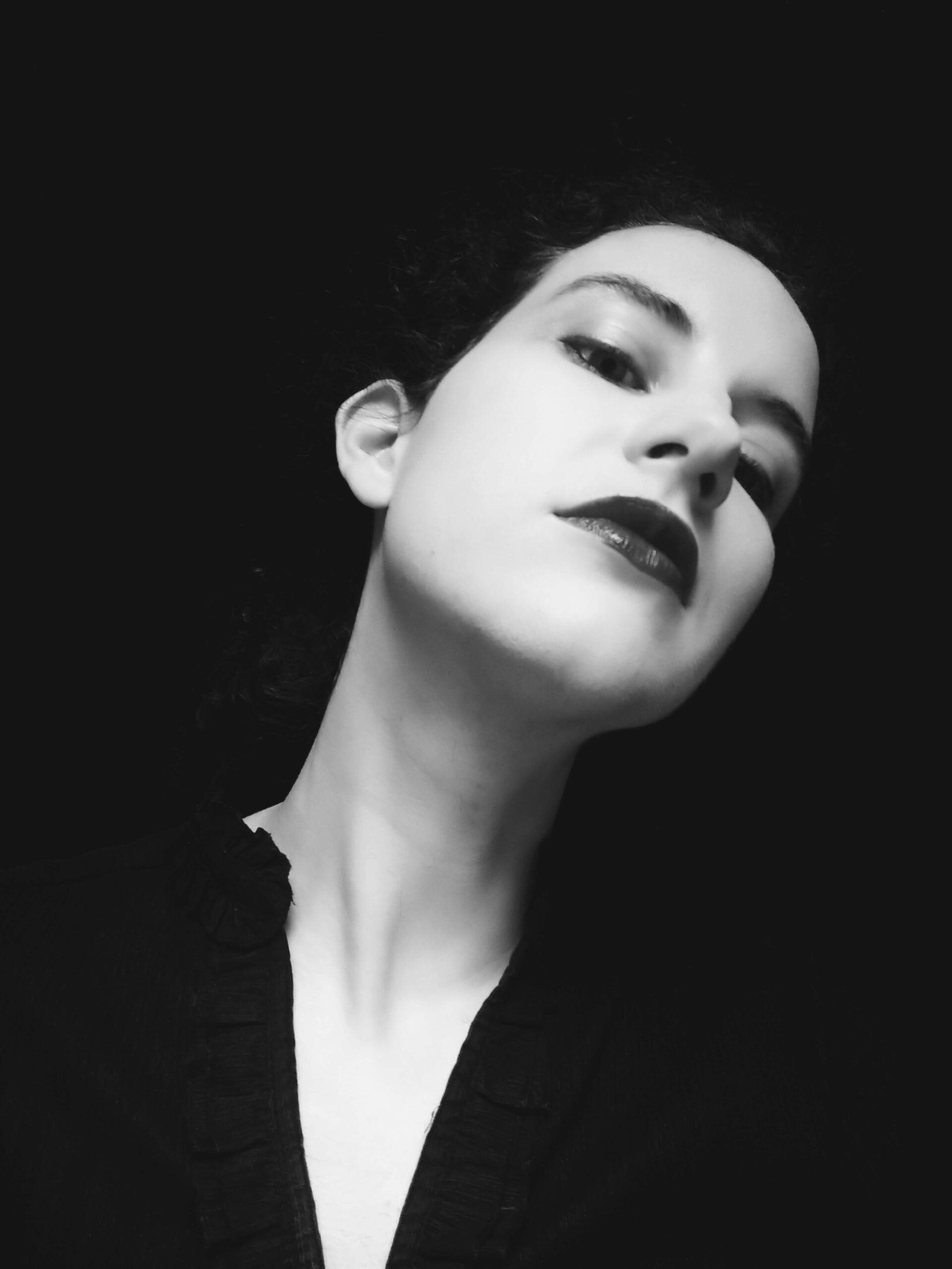 Black and white photo of author Hana Carolina